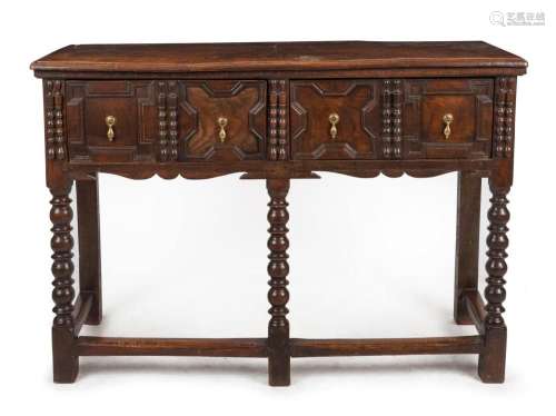 A Charles II antique English oak two drawer servery table, f...
