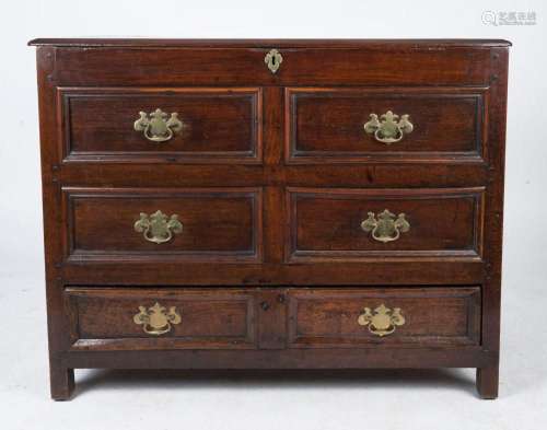An antique English oak mule chest with ogee moulded blind dr...