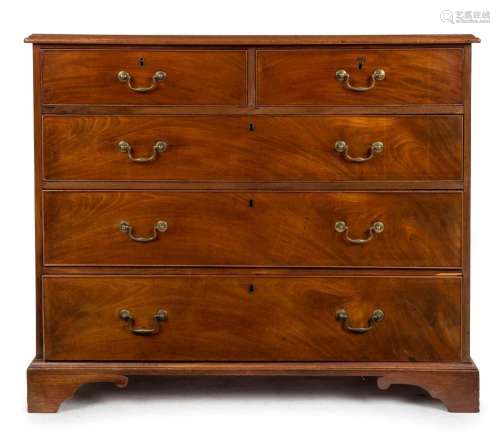 A Georgian mahogany five drawer chest with cockbeading and o...