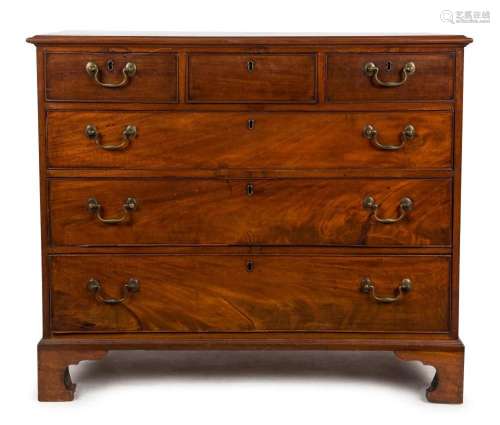 A Georgian mahogany six drawer chest with unusual three draw...