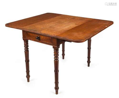 A Georgian oak drop-side occasional table with fine ring tur...