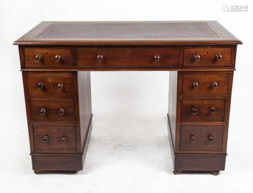 An antique English mahogany twin pedestal ladies desk with b...