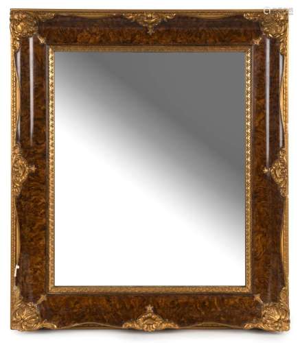 An antique style mirror with gilt and faux timber frame, 20t...