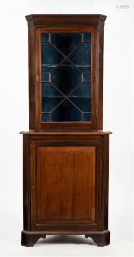 A Georgian style antique English mahogany corner cabinet wit...