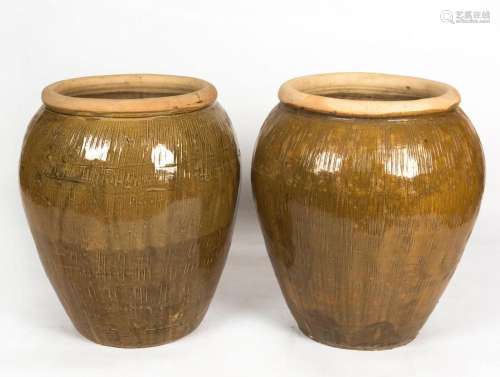 A pair of pottery garden urns, 20th century, 65cm high, 60cm...