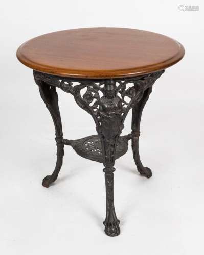 An antique pub table with cast iron Britannia base and timbe...