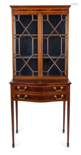 A Sheraton Revival bow front bookcase, mahogany with strong ...