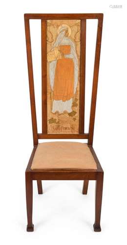 An English Arts & Crafts high back walnut chair with tap...