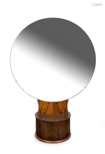 An Art Deco circular dressing mirror with cylindrical walnut...