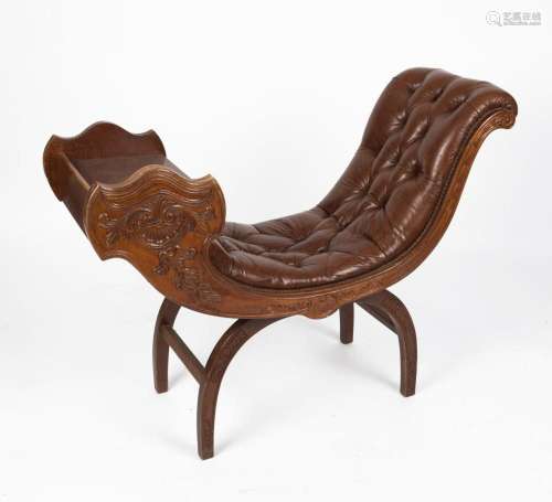 A vintage telephone seat, carved wood with brown button upho...