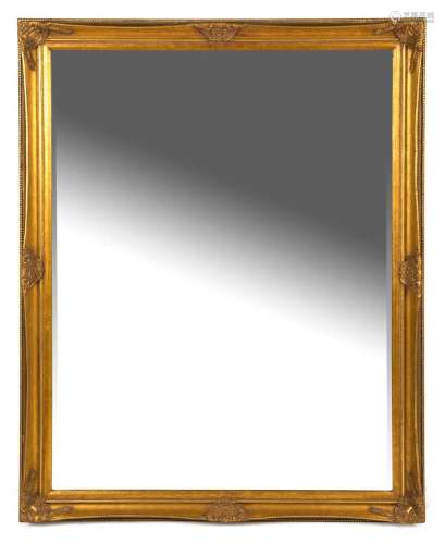 A reproduction gilt framed mirror with bevelled glass, 140 x...