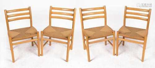 A set of four Scandinavian beech dining chairs with woven ru...