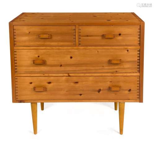 A vintage pine four drawer chest with exposed joinery, circa...