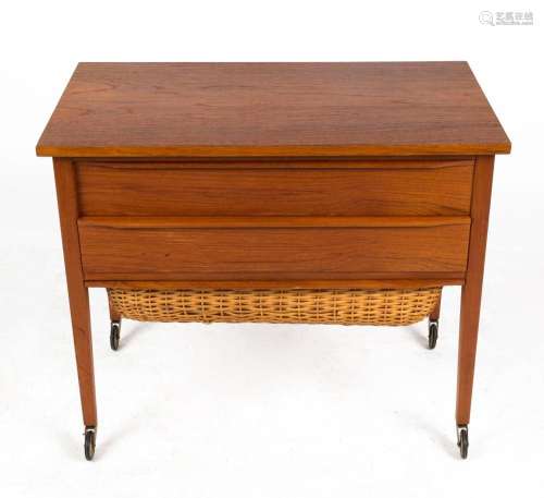 A vintage Danish teak two drawer sewing table with basket un...