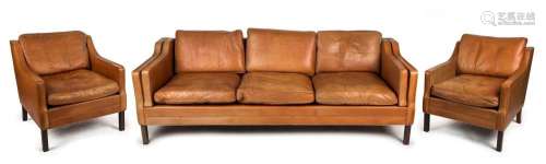 A vintage Scandinavian brown leather three seat settee, 220c...