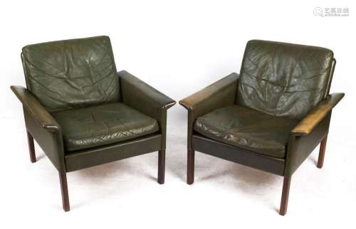 A pair of retro green leather flared armchairs, circa 1960, ...