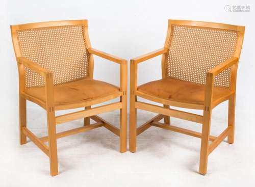 A pair of Scandinavian blond timber armchairs with camel lea...