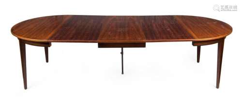 A vintage Danish rosewood extension dining table with fold-d...