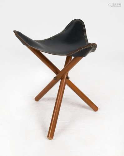 A tripod folding base leather top saddle stool, 47cm high