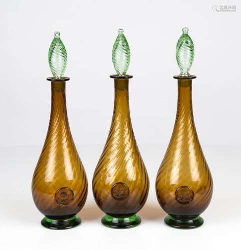 HOLMEGAARD set of three Danish glass decanters, circa 1970, ...