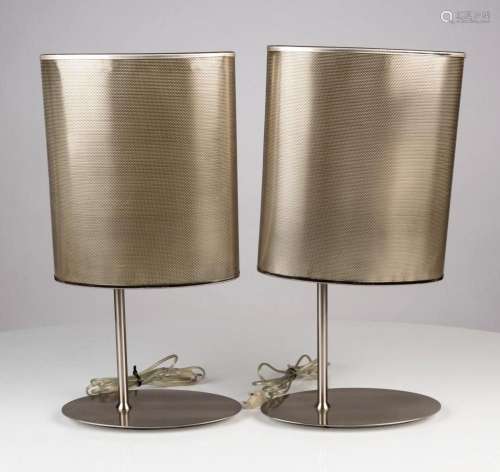 A pair of metal table lamps and shades of oval form, Note: P...
