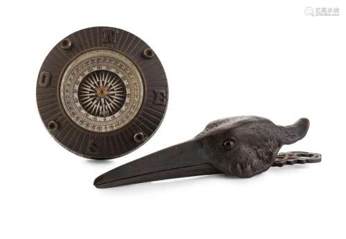 An antique bronze paperweight with inset compass; together w...