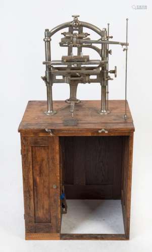 An antique engraving apparatus with associated pieces, 19th ...