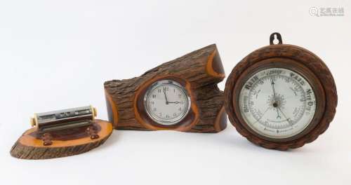 A vintage mulga wood desk set, clock and wall barometer, 19t...