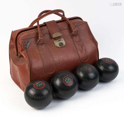 Vintage lawn bowls in travel bag, mid 20th century