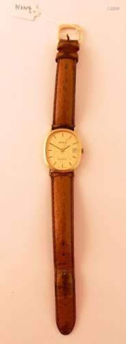 Montre d'homme en or jaune. Boitier ovale (32 x 27 mm) cadra...