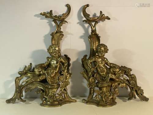 Paire de chenets en bronze ciselé et doré à décors de Putto ...