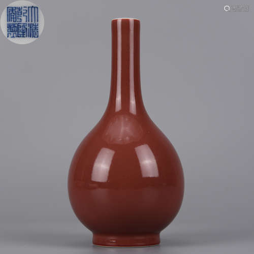 A RED-GLAZED VASE