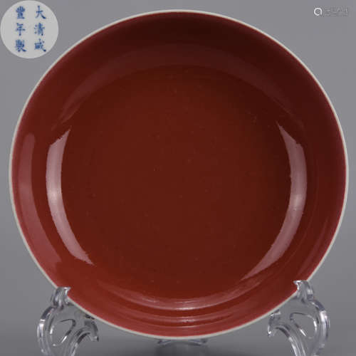 A RED-GLAZED PLATE