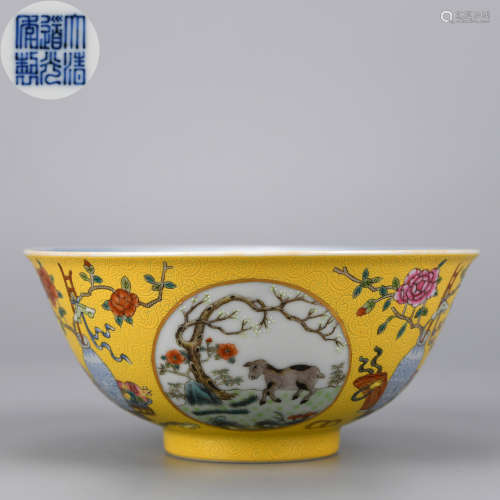 A YELLOW GROUND BLUE AND WHITE FAMILLE ROSE THREE RAMS BOWL