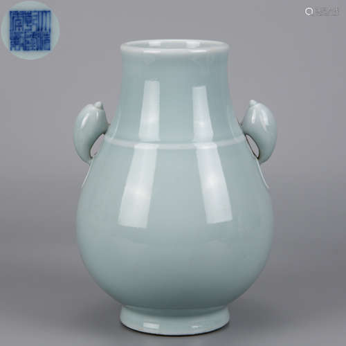 A CELADON GLAZED DOUBLE-DOVE-EARED VASE