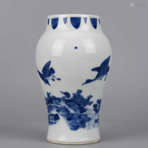 A BLUE AND WHITE FLOWER AND BIRD JAR