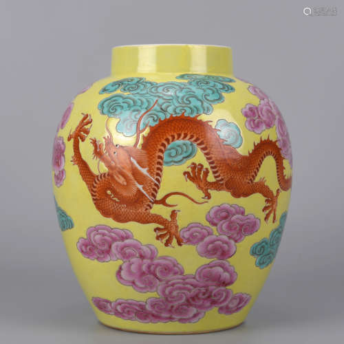 A  YELLOW GROUND FAMILLE ROSE CLOUD AND DRAGON JAR