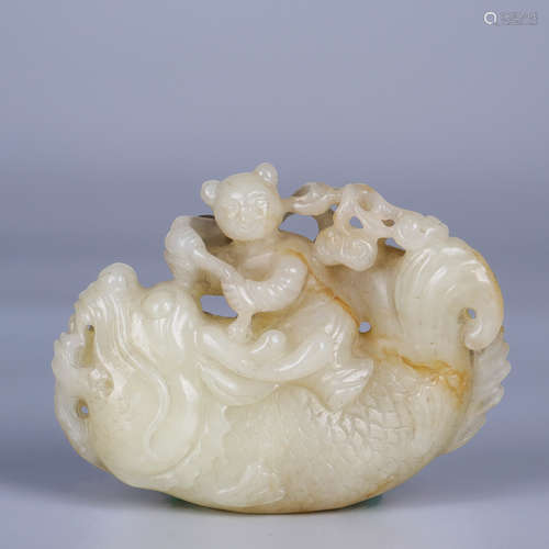 A HETIAN JADE FIGURAL BEAST ORNAMENT