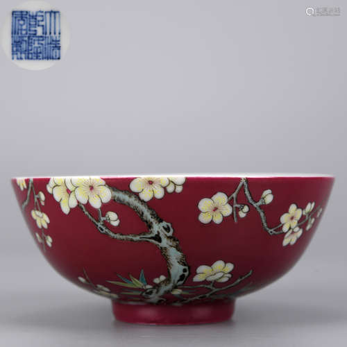 A ROUGE-RED GLAZED BAMBOO AND PLUM BLOSSOM PATTERN BOWL