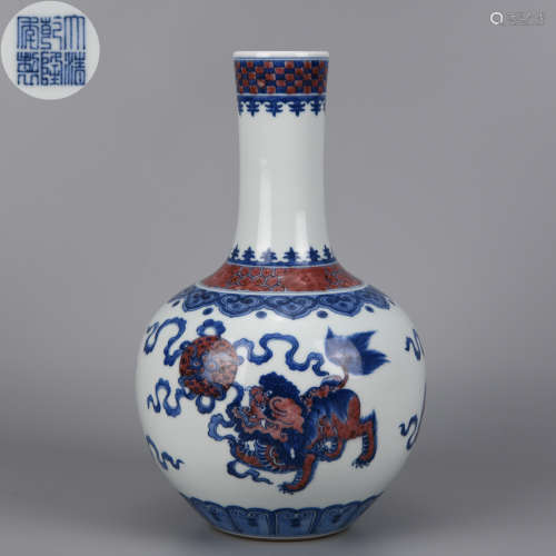 A BLUE AND WHITE UNDERGLAZE RED LION PLAY WITH BALL TIANQIUP...