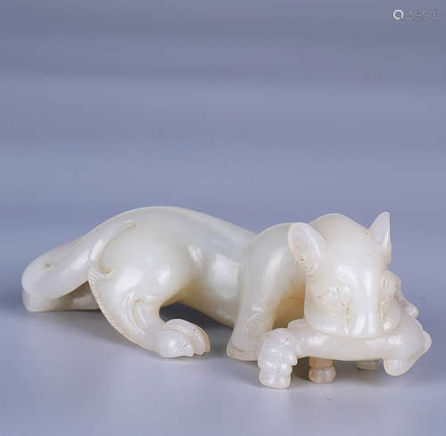 A HETIAN JADE BEAST ORNAMENT