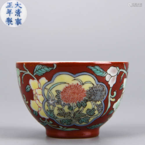 A RED GROUND YANGCAI-GLAZED FLOWER CUP