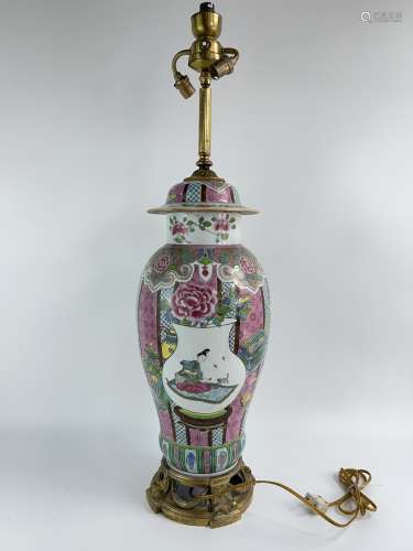 A large famille-rose porcelain table lamp depicted with baut...