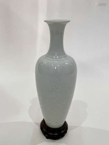A white incraved vase, Qing Dynasty Pr.