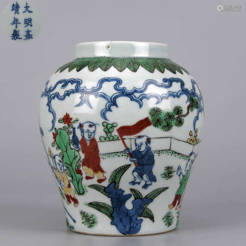 A BLUE AND WHITE WUCAI GLAZED CHILDREN PLAY FIGURAL VASE