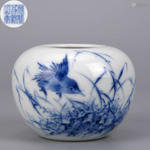 A BLUE AND WHITE FLOWER AND BIRD WATER POT