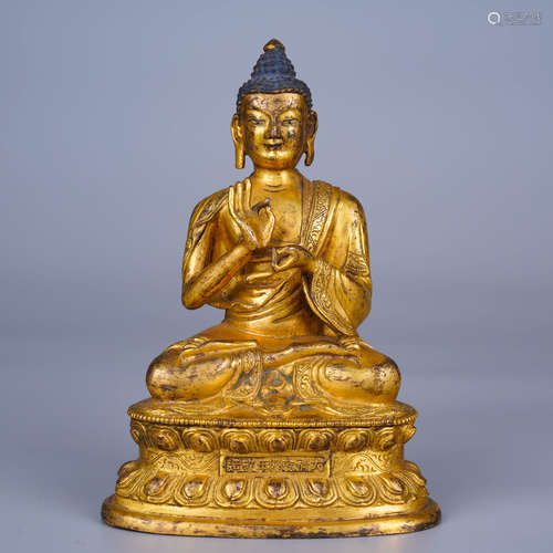 A GILT BRONZE STATUE OF BUDDHA