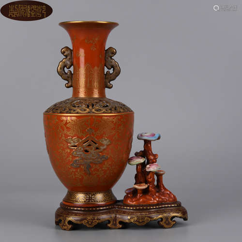 A GILT RED GROUND FLOWER LINGZHI CARVED DOUBLE EARED VASE