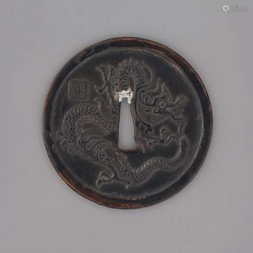 A LACQUERED IRON TSUBAEDO PERIOD (18TH CENTURY), SEALED KAN ...