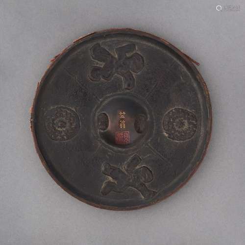 A ROUND LACQUER MODEL OF AN ANCIENT MIRROREDO PERIOD (18TH-1...